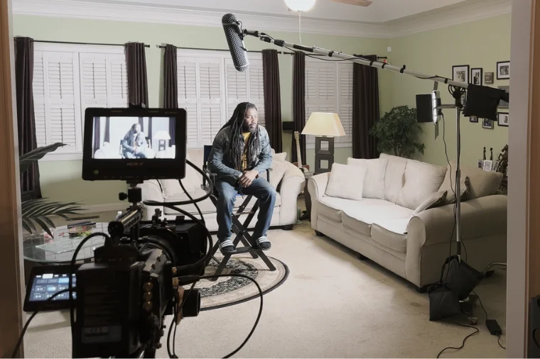 Crew setting up camera gear for a late-night scene